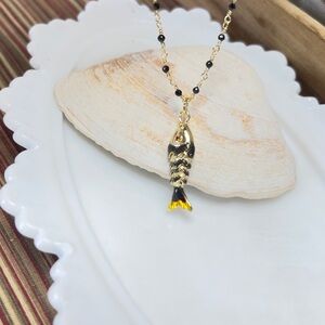 Gold and Black Fish Pendant Necklace